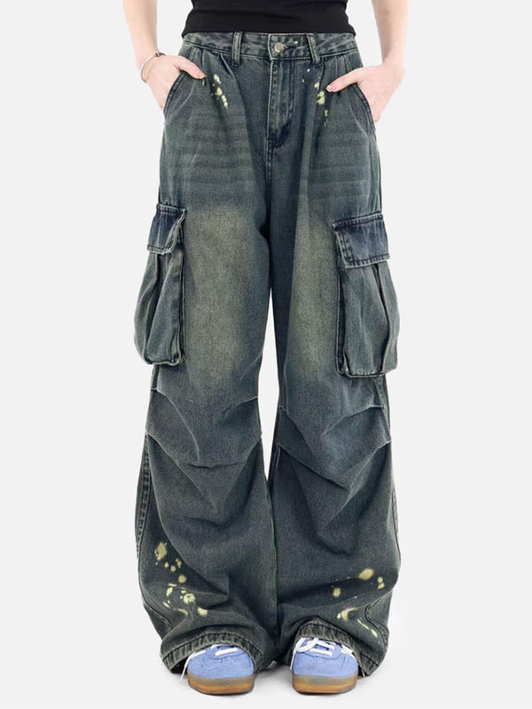 TALISHKO baggy jeans with splash-ink wash, worn by model, featuring large side pockets.