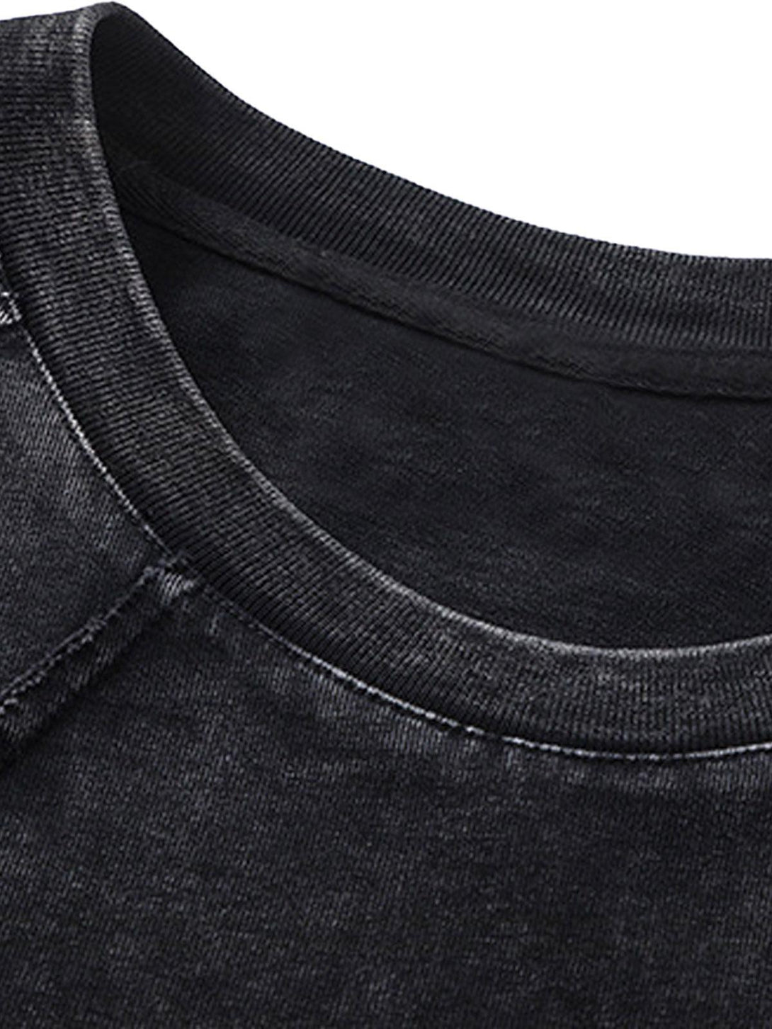 Focusing on the neckline detail of a TALISHKO split raw edge short sleeve T-shirt in black.
