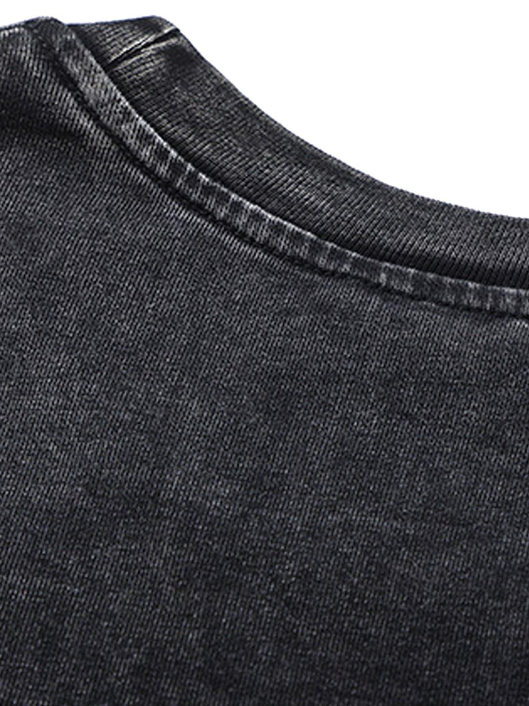 Detailed view of the black split raw edge neckline on a TALISHKO short sleeve T-shirt.