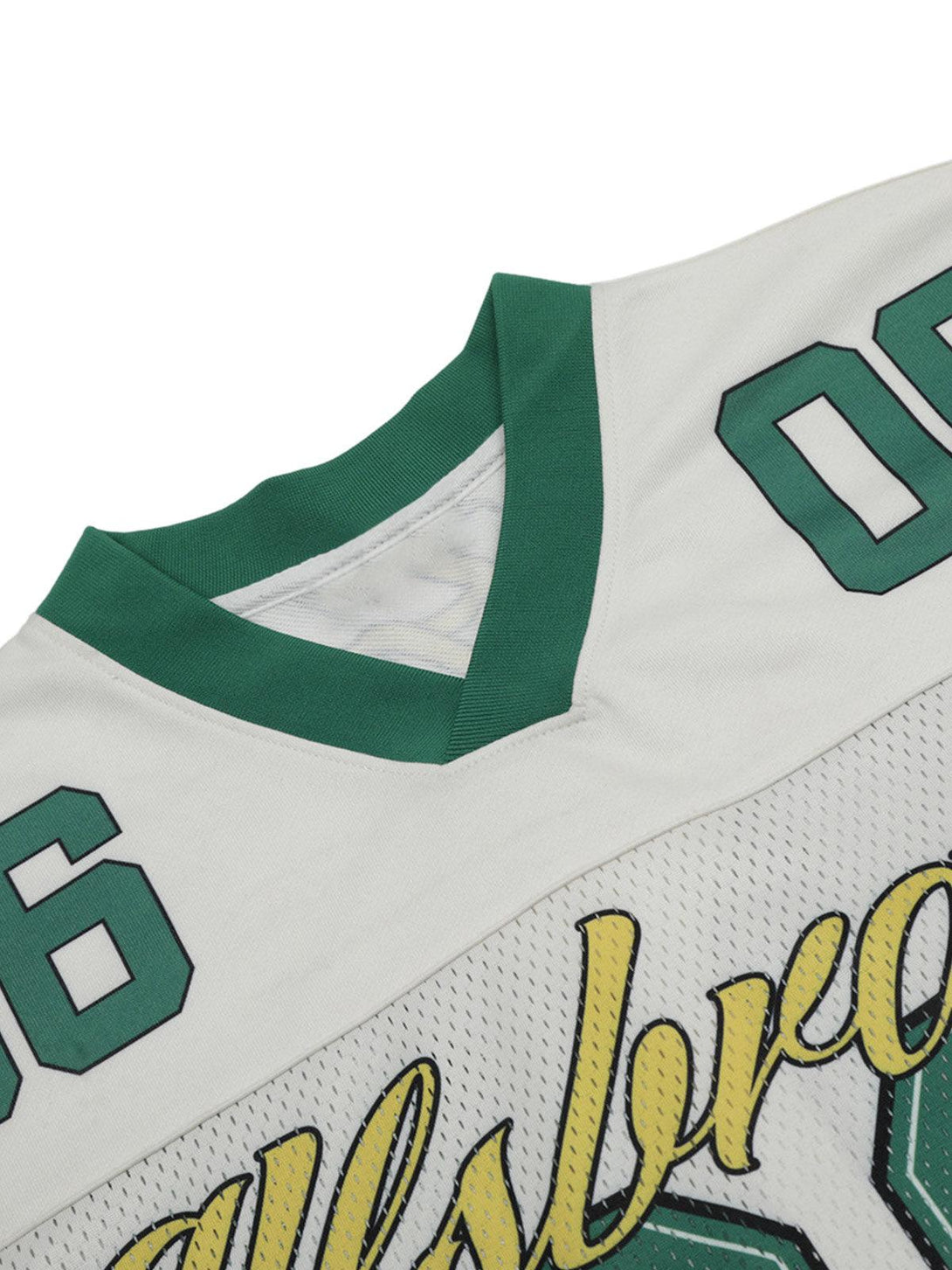 Focusing on the neckline and design details of a TALISHKO sports jersey V-neck T-shirt.