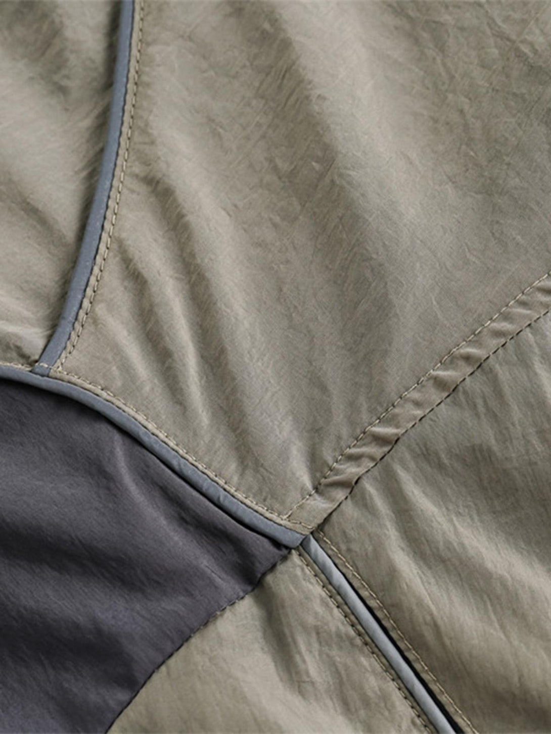 A detailed view of TALISHKO sporty long-sleeve T-shirt fabric and stitching.