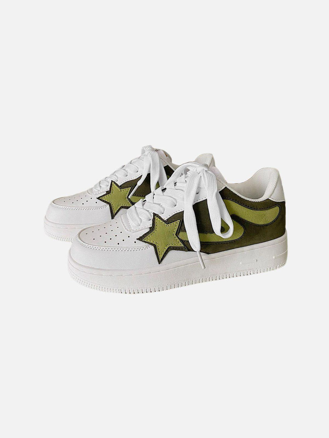 Stylish white sneakers with green star accents by TALISHKO, perfect for casual outfits.