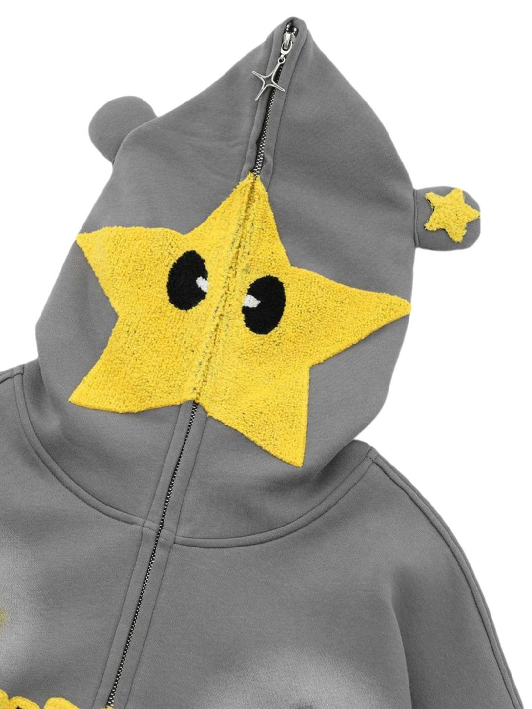 A playful close-up of TALISHKO's hooded sweatshirt, highlighting yellow star embroidery and ear details.