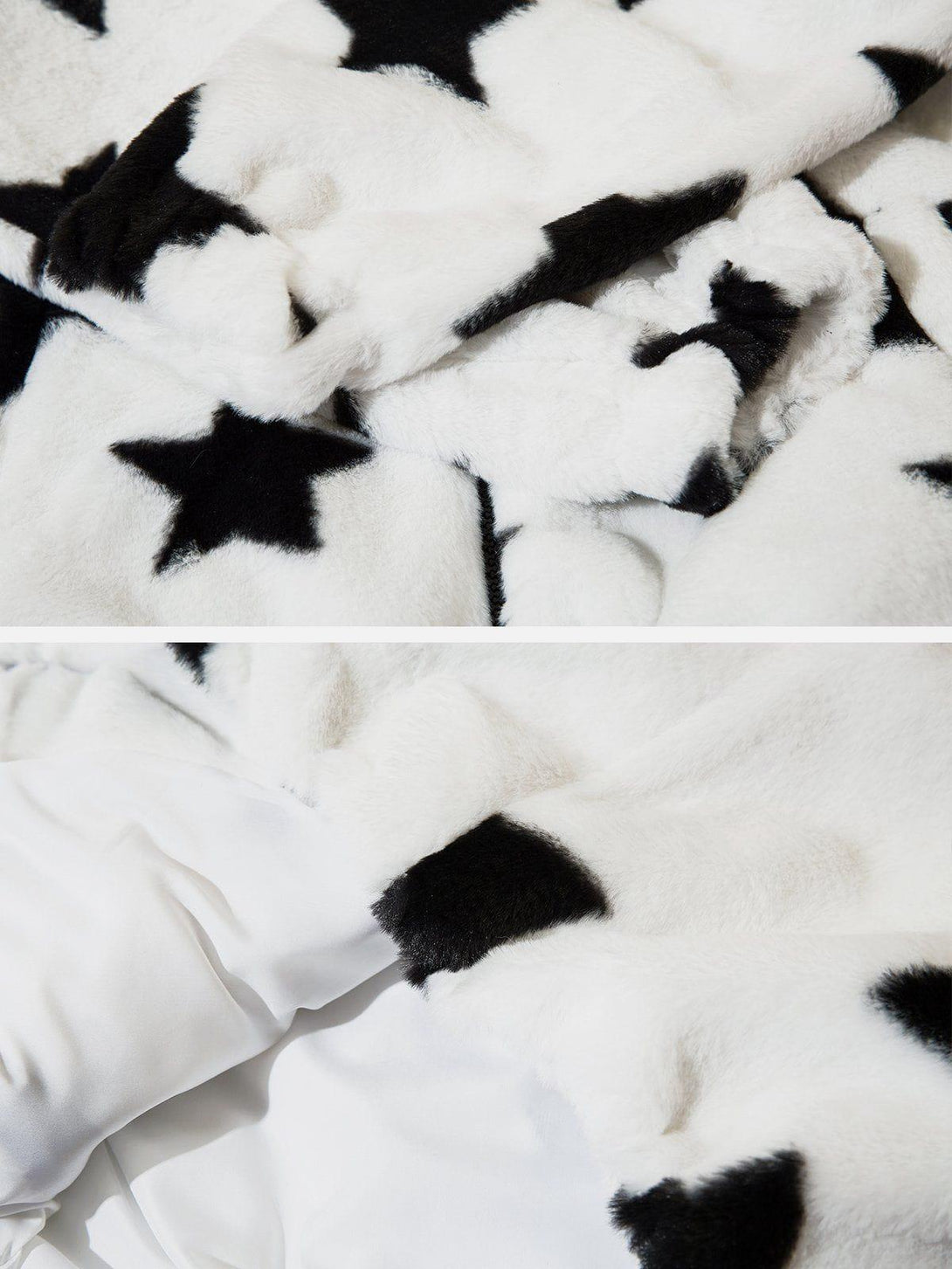 Zoomed-in texture of TALISHKO's hoodie, highlighting soft white fabric with bold black stars.