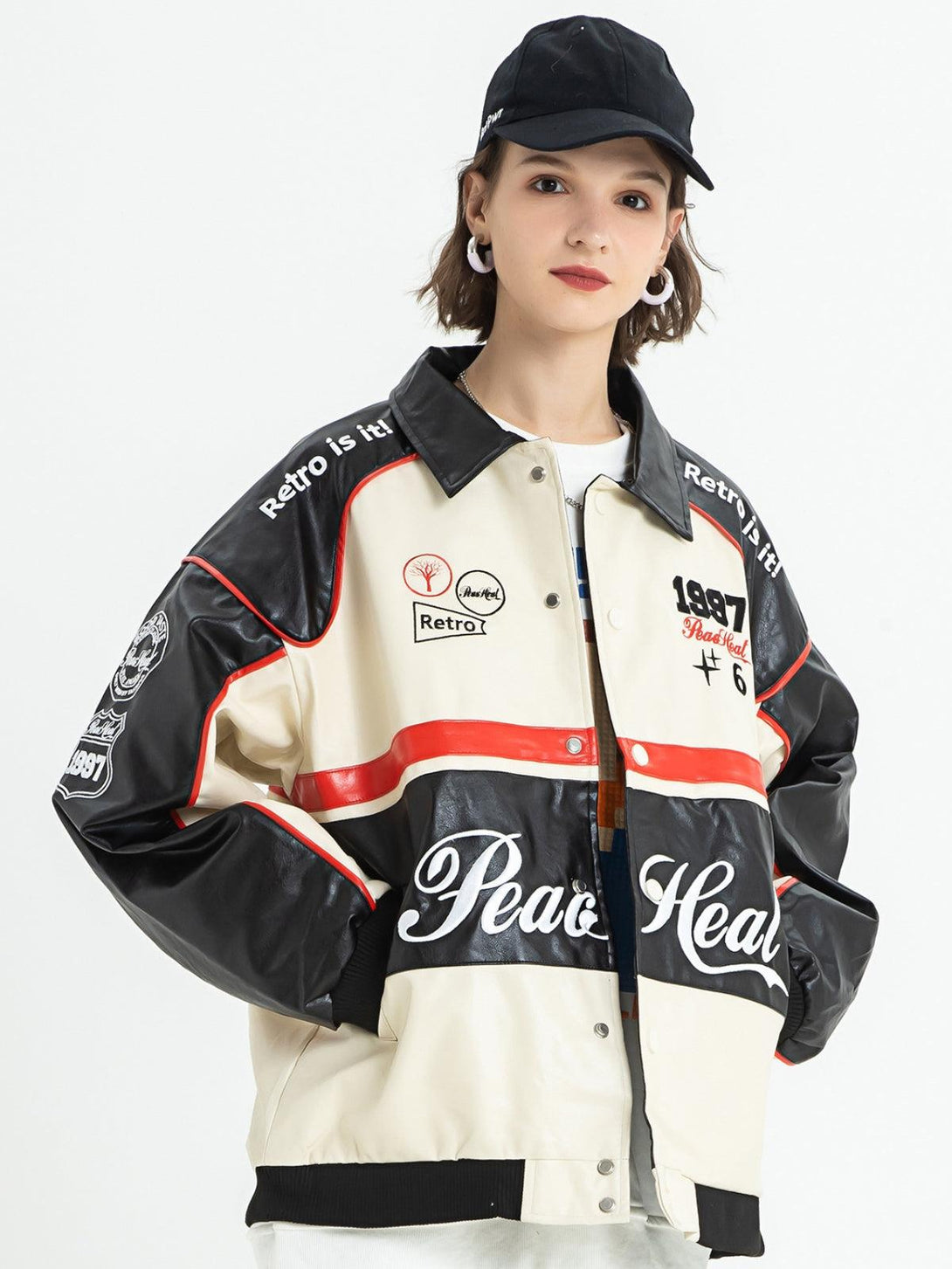 Model wearing a retro-inspired motorcycle jacket by TALISHKO, featuring bold color stitching.