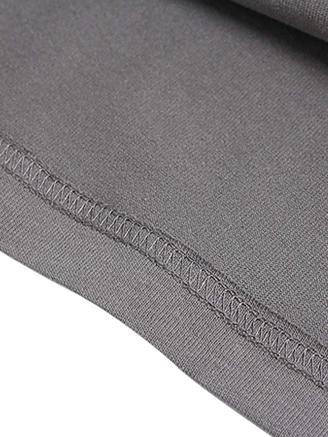 Detailed fabric and stitching on a TALISHKO graphic T-shirt, highlighting quality craftsmanship.