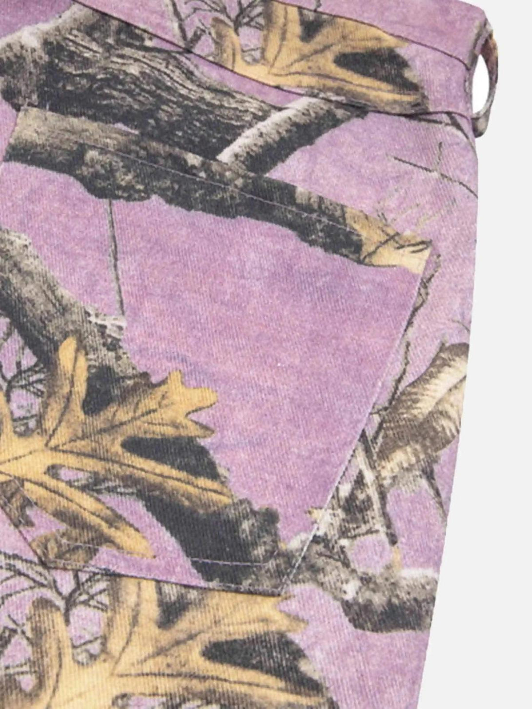A detailed view of TALISHKO's street-inspired camouflage pants, highlighting the branch pattern.