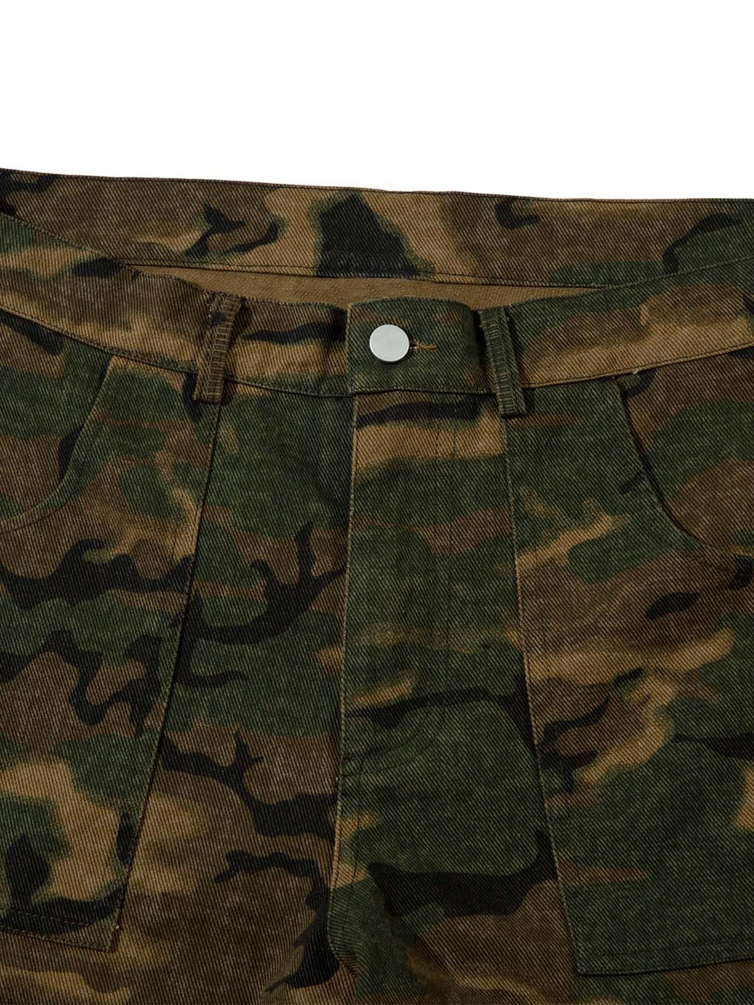 A detailed view of TALISHKO camouflage cargo pants, highlighting the textured fabric and design.