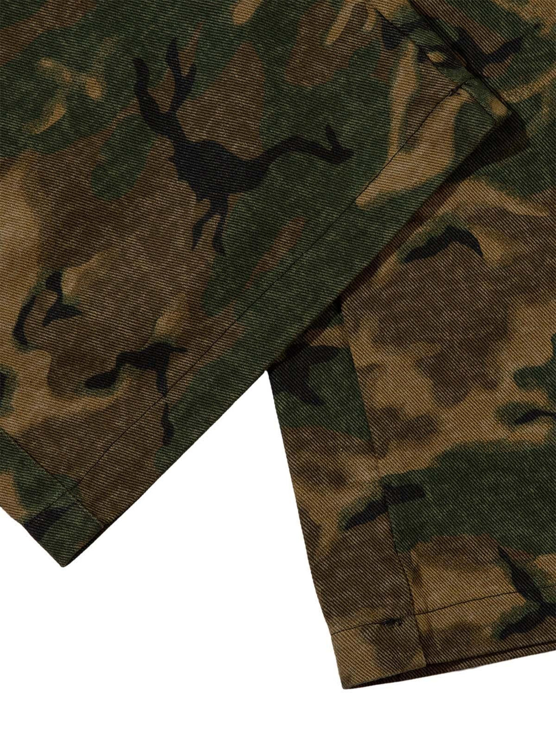 Intricate look at TALISHKO camouflage cargo pants, highlighting the rugged texture and pattern.