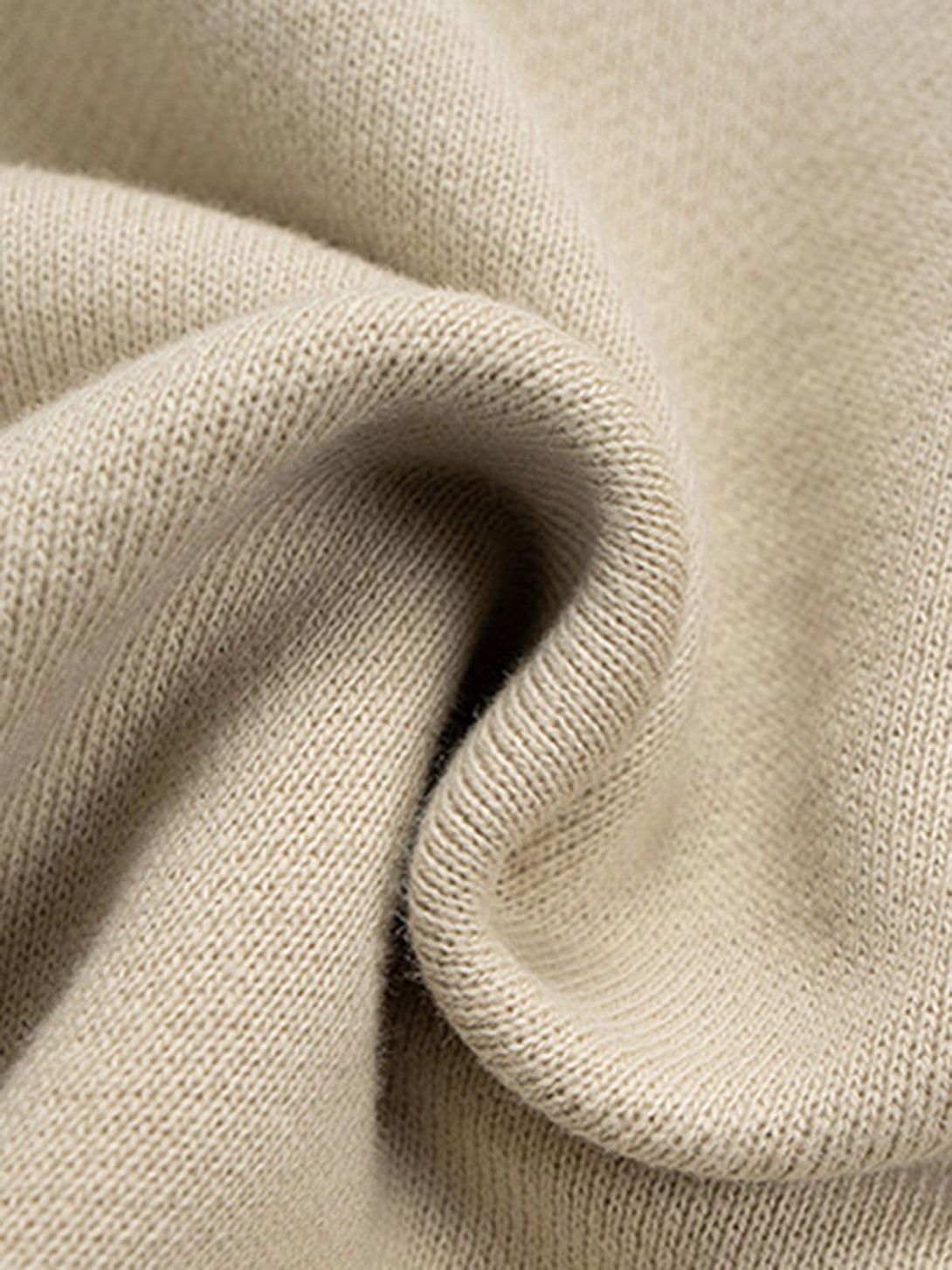 Zoomed-in texture of TALISHKO's street cleanfit drawstring shorts, highlighting knit detail.