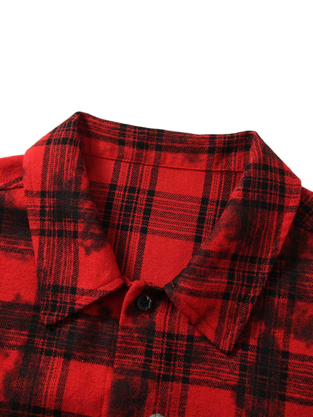 Zoomed-in texture of the red plaid shirt collar by TALISHKO, highlighting bold pattern details.