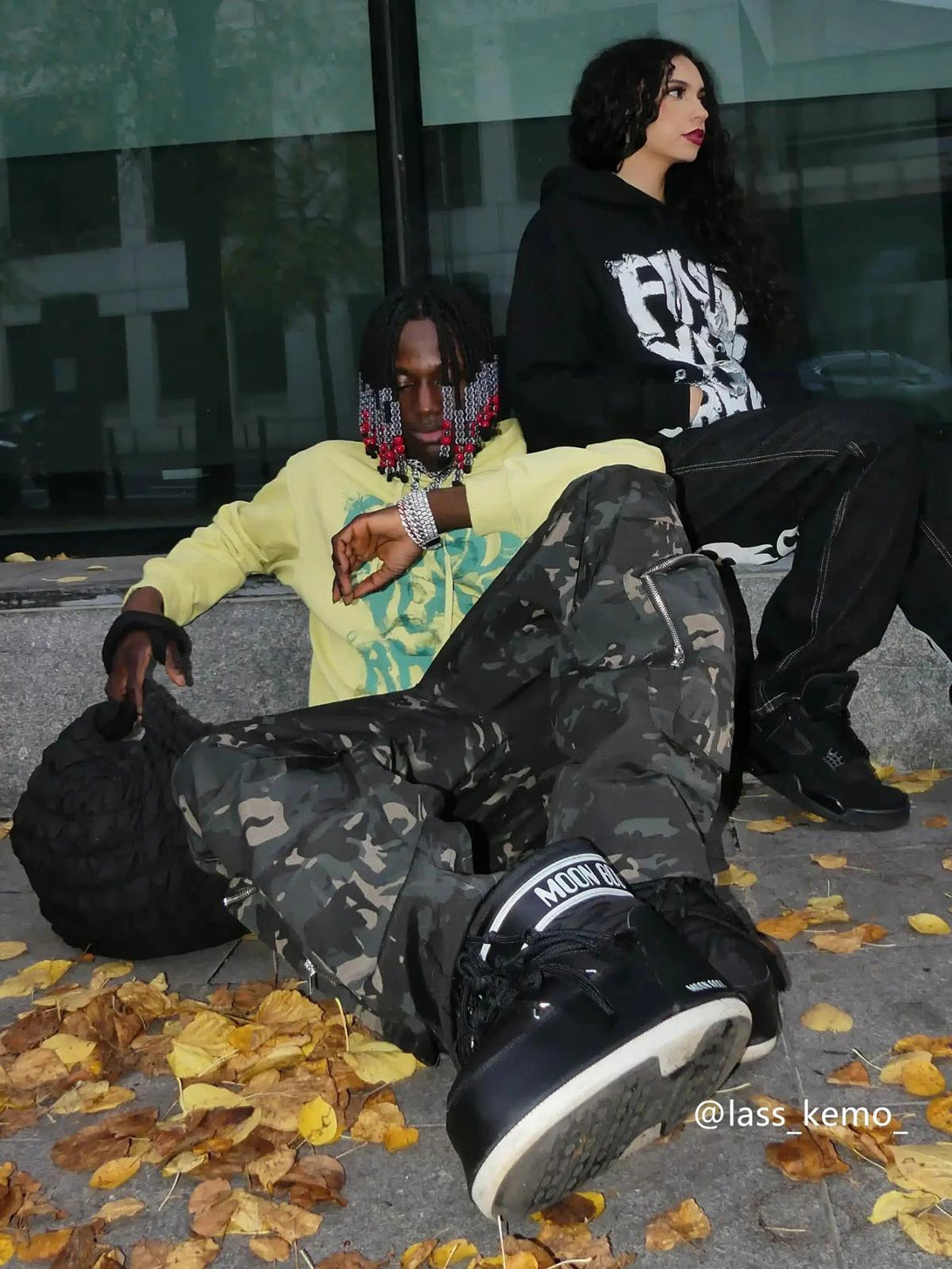 Models in TALISHKO urban camouflage cargo pants, styled with hoodies and chunky sneakers.