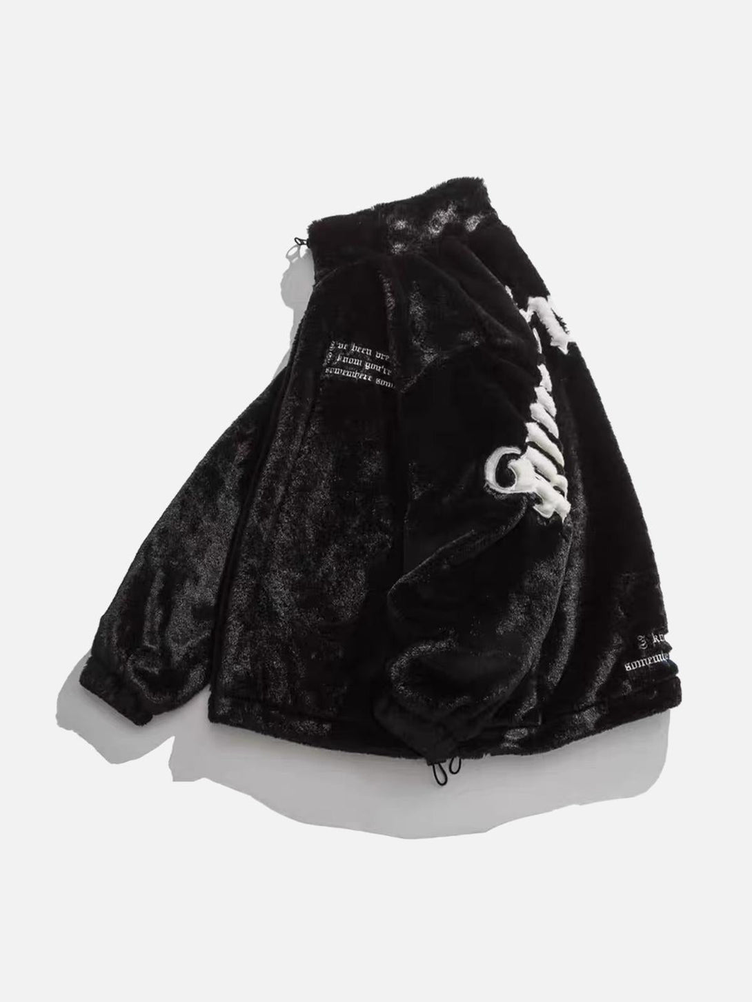 Side angle of TALISHKO's fleece jacket, highlighting plush texture and stylish embroidery.