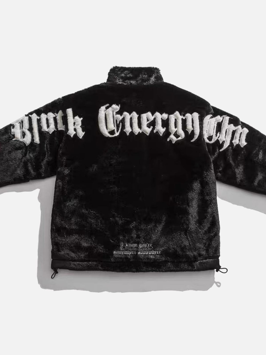 Back detail of TALISHKO's fleece jacket highlighting bold street-inspired embroidery.