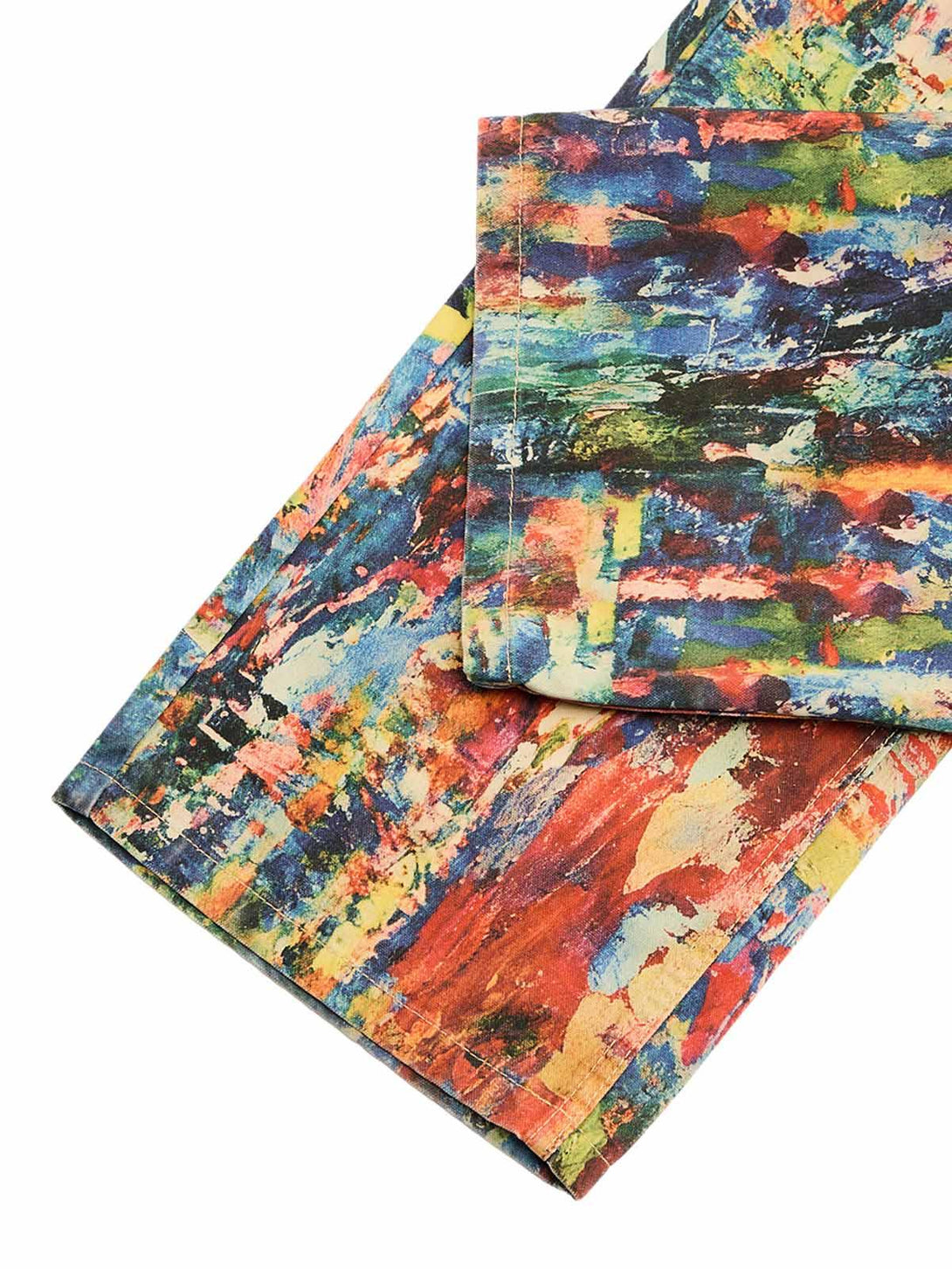 Texture and pattern showcased in TALISHKO's vibrant jeans with an artistic oil painting design.