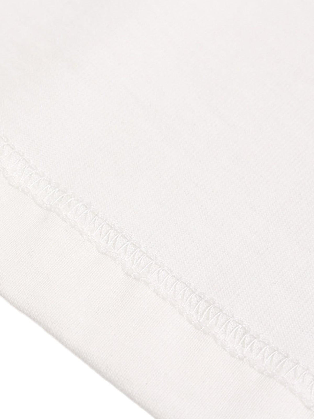 Zoomed-in view of TALISHKO T-shirt's stitching, highlighting intricate craftsmanship and quality.