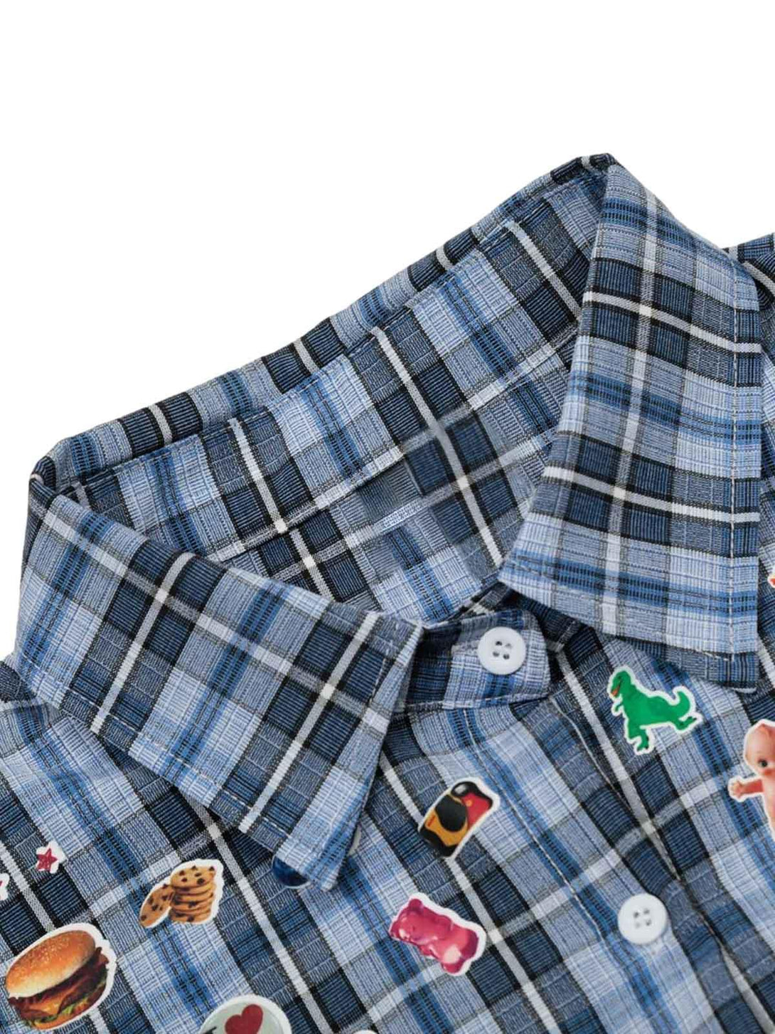 TALISHKO's blue plaid shirt features quirky patch details, highlighting its retro charm.