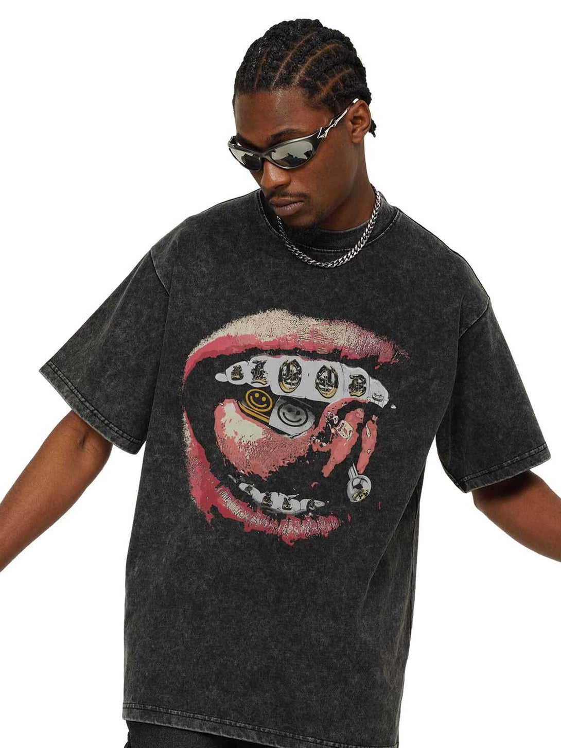 Model in a TALISHKO washed black lip print T-shirt, capturing edgy street fashion vibes.