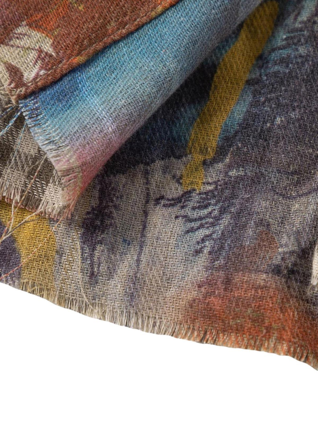 Intricate look at the vibrant fabric and stitching of a reversible short-sleeved shirt by TALISHKO.