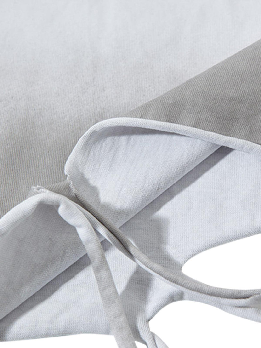 A close-up of TALISHKO's street star graphic vest, highlighting the soft fabric texture.