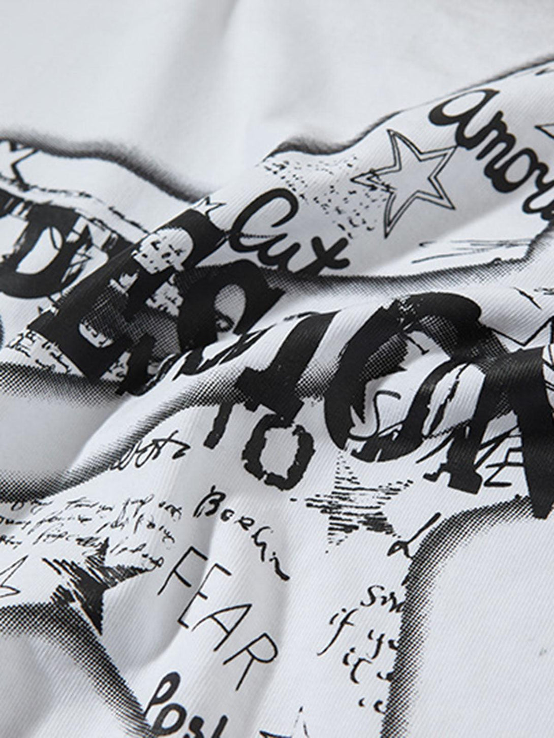 Intricate look at the street star graphic design on a vest by TALISHKO, showcasing bold typography.