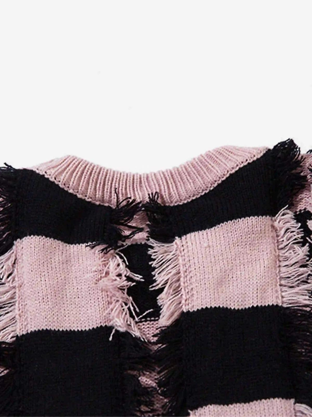 Intricate look at TALISHKO sweater's pink and black stripes with distressed detailing.