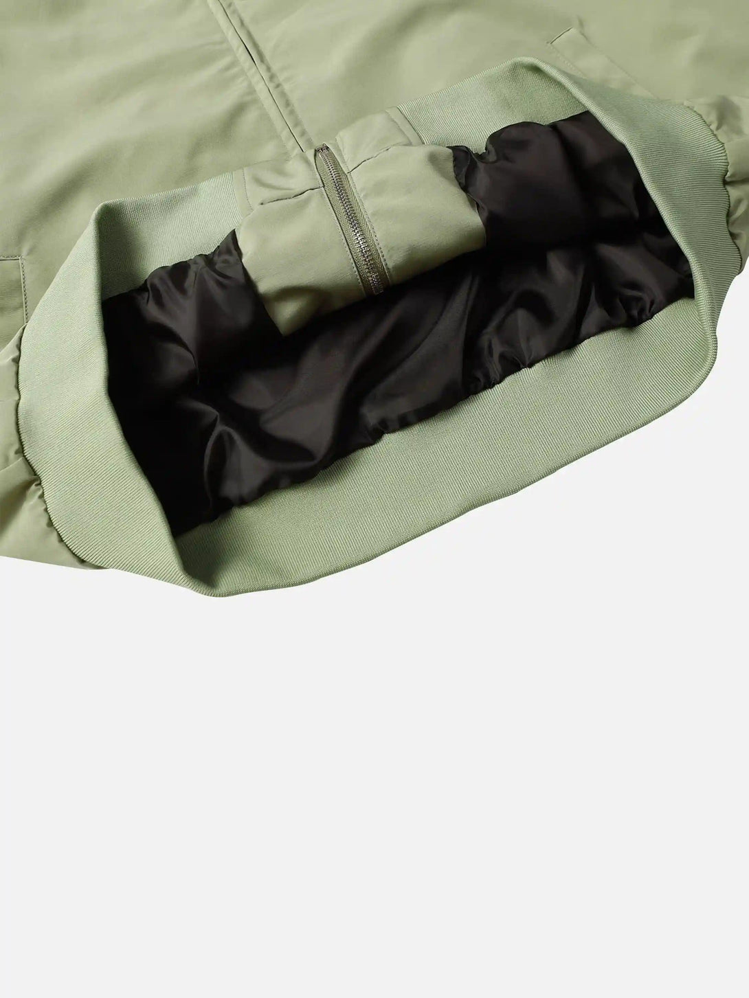 Detailed look at the interior lining of the TALISHKO zip-up jacket, highlighting quality craftsmanship.