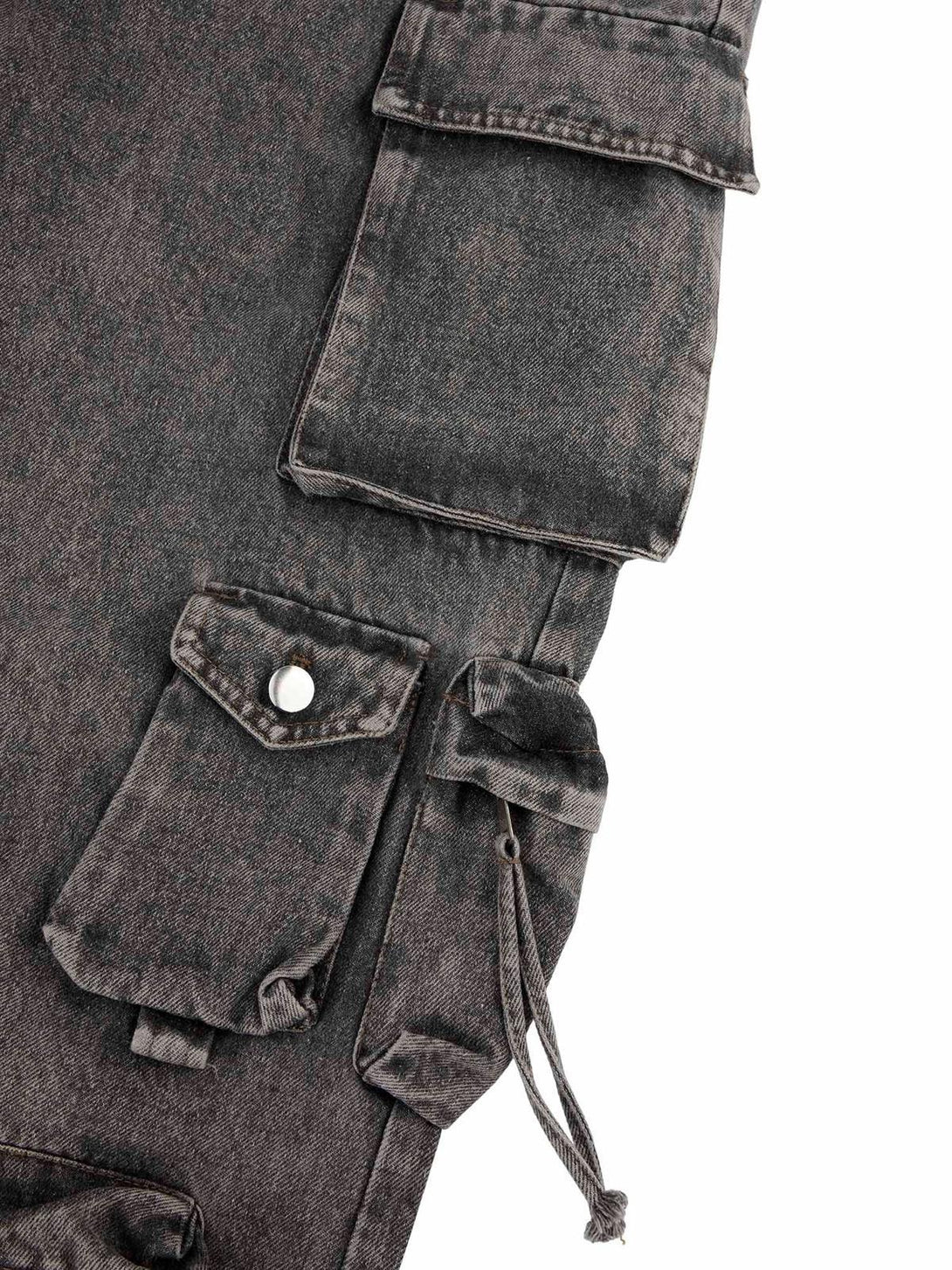 Focusing on TALISHKO's workwear jeans, highlighting the rugged multi-pocket design and texture.