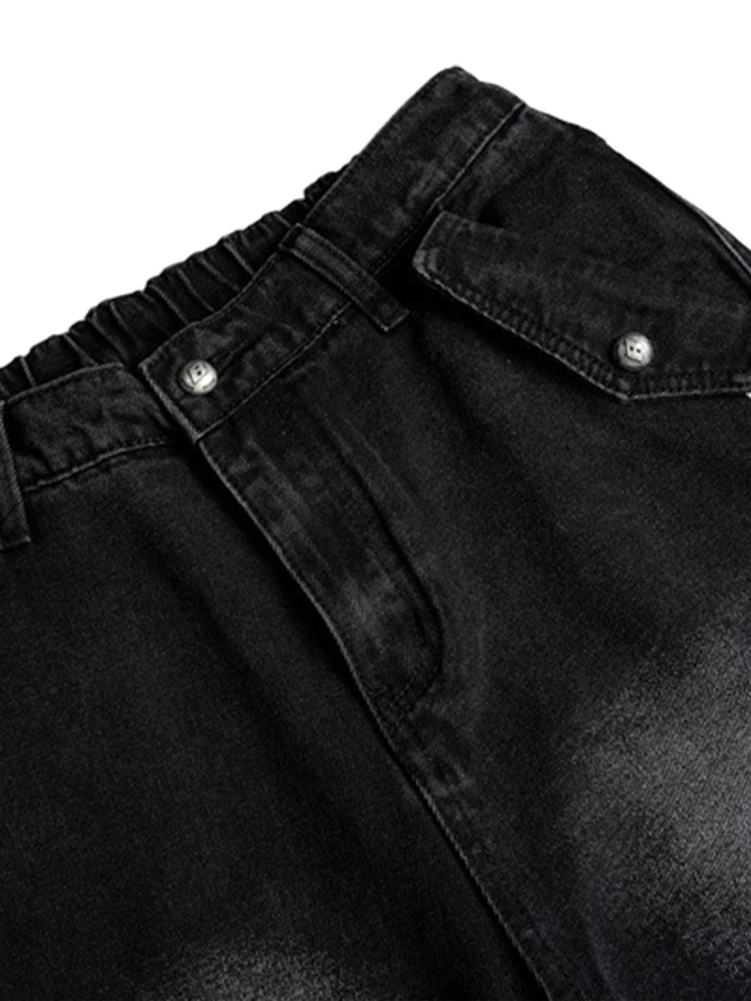 Detailed look at TALISHKO black work jeans with textured fabric and stylish pocket design.