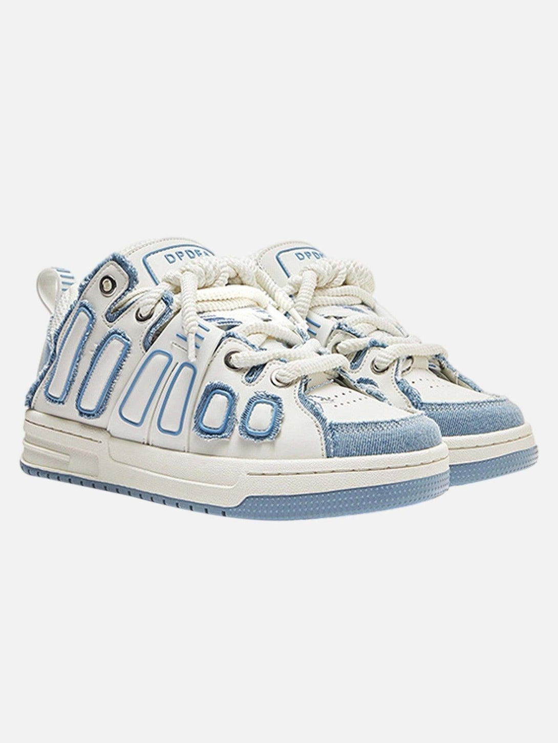 Street-style sneakers by TALISHKO with denim accents and blue highlights in a front view.