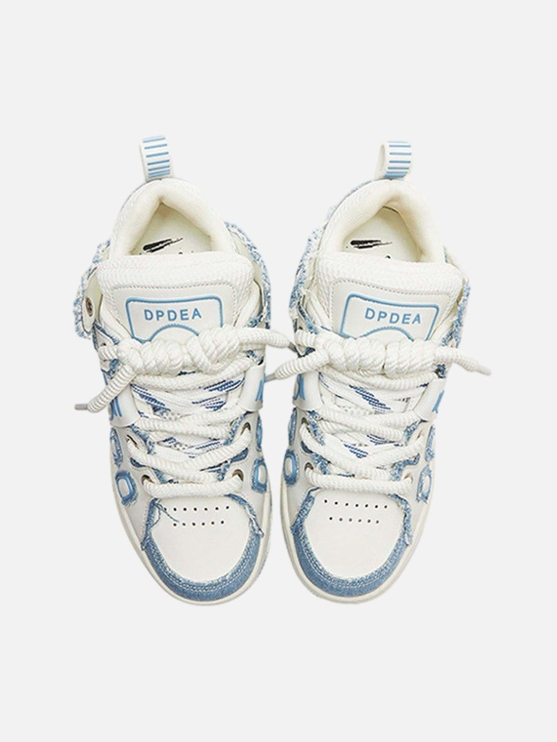 TALISHKO street trend sneakers in white and blue, highlighting intricate lace and logo details.