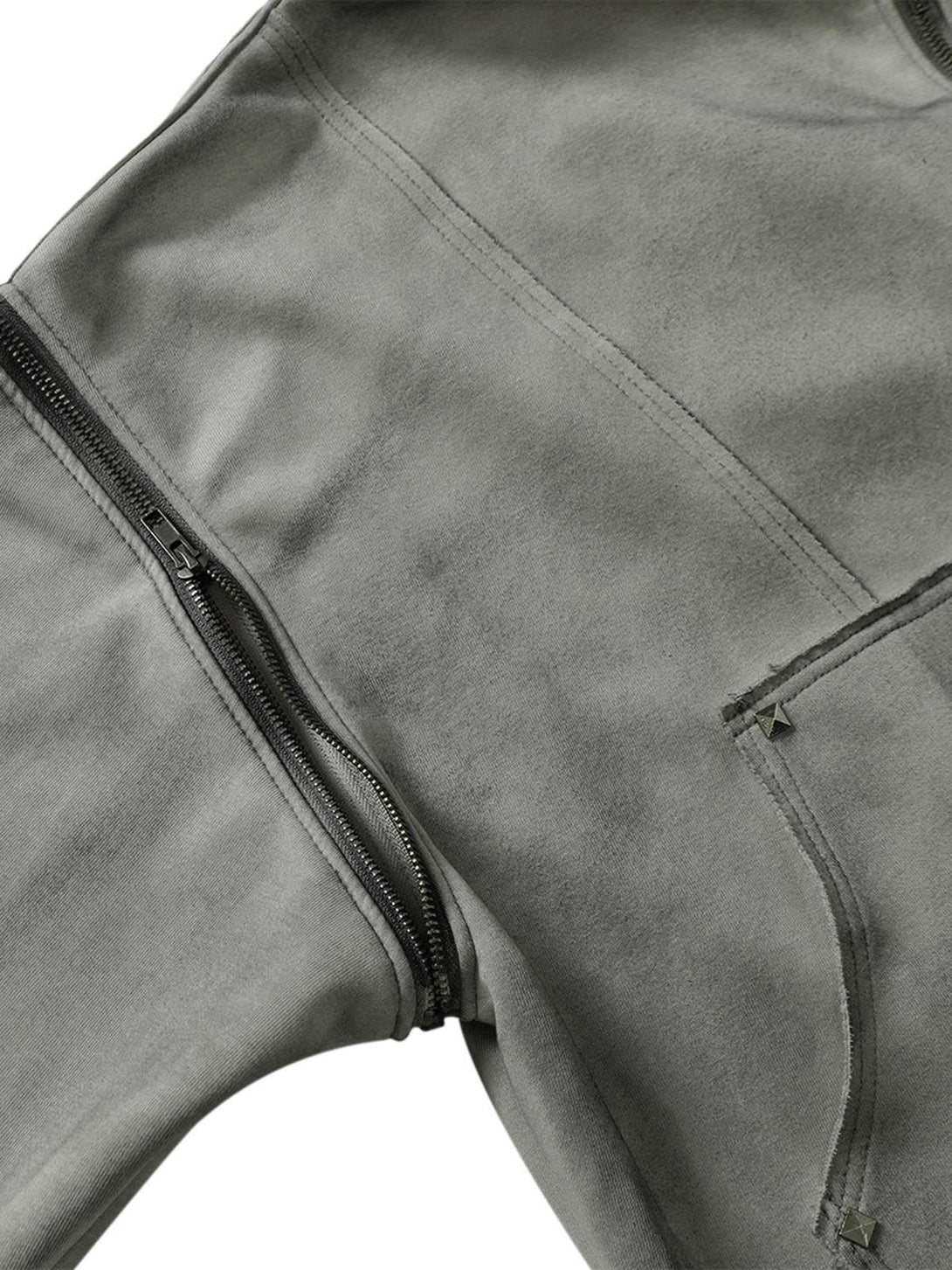 Detailed fabric and stitching on a TALISHKO hooded jacket, highlighting its unique design elements.