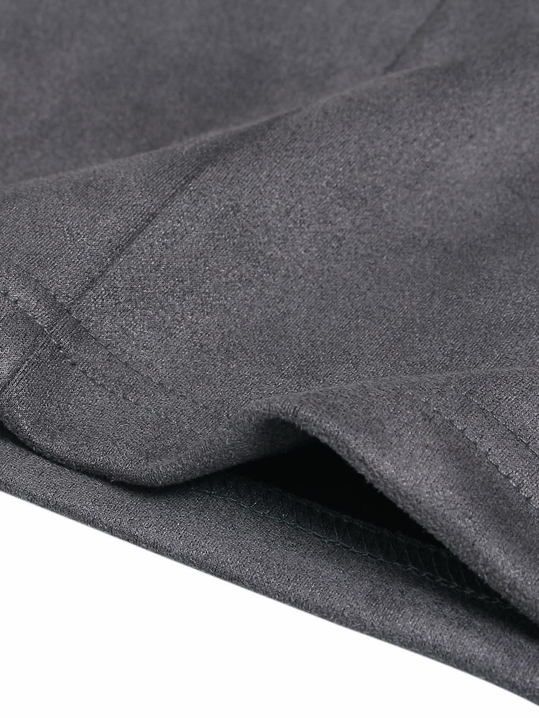 "Zoomed-in texture of TALISHKO T-shirt, showcasing the soft fabric and stitching details."