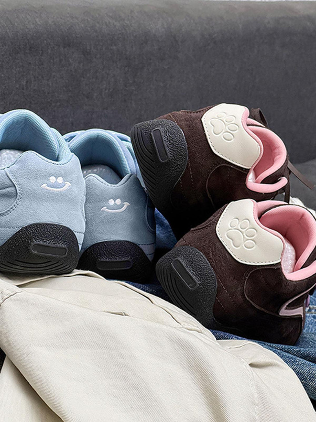 Suede lace-up sneakers by TALISHKO in blue and brown, featuring playful embroidered details.