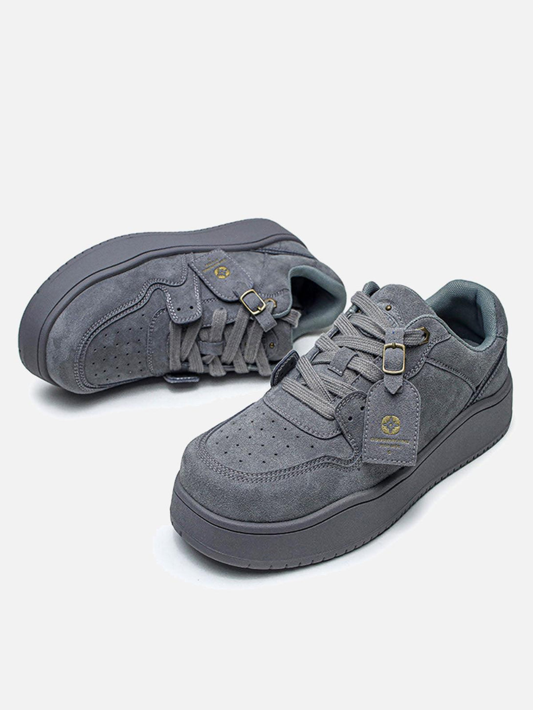 Gray suede low-top skate shoes by TALISHKO, highlighting design details and craftsmanship.