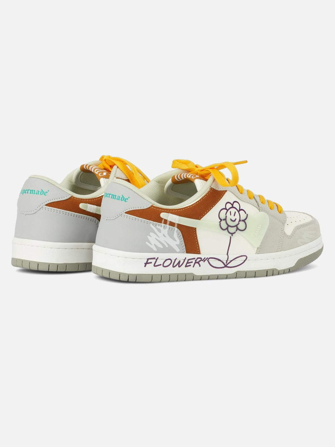 Back view of TALISHKO skate shoes featuring a cheerful flower graphic and vibrant yellow laces.