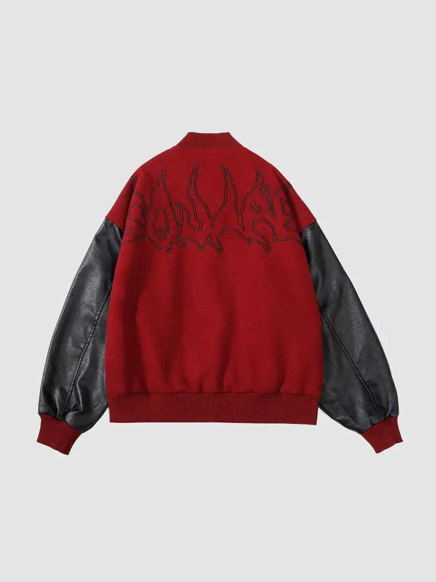 Back view of TALISHKO's red racing jacket showcasing symbolic embroidery and sleek PU leather sleeves.