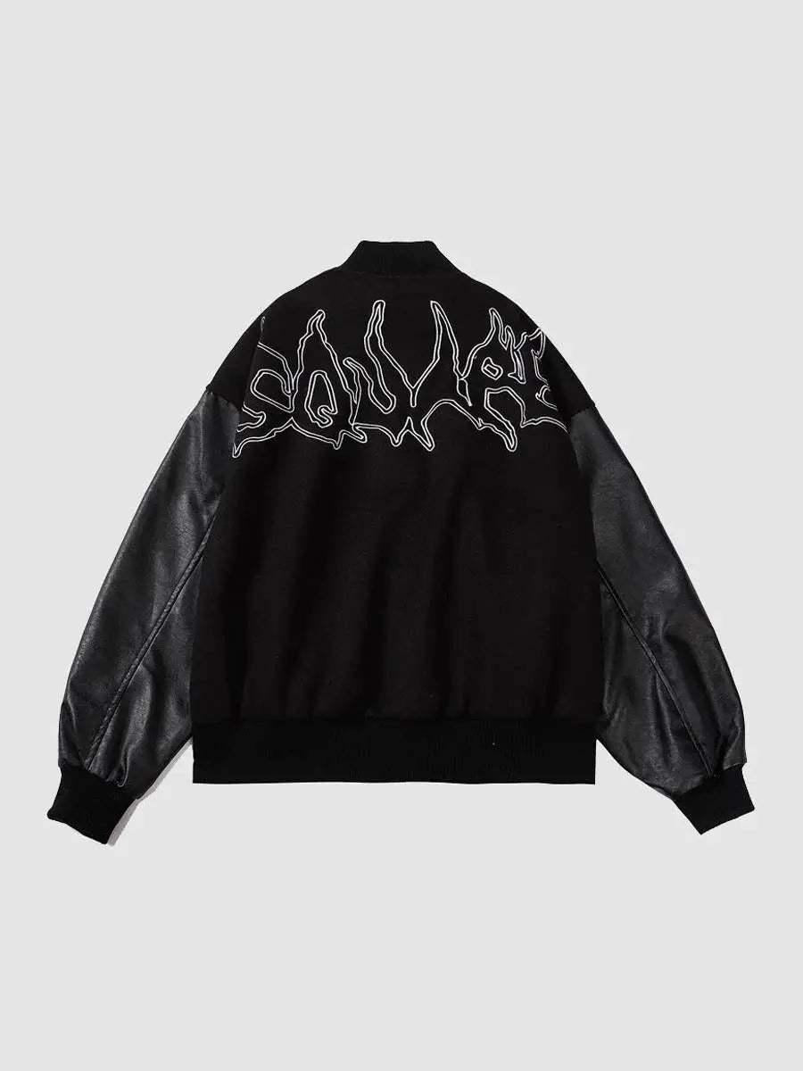 Back view of TALISHKO's racing jacket featuring symbolic embroidery and sleek PU leather sleeves.