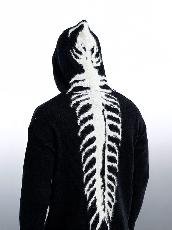 Back view of a black TALISHKO sweater hoodie featuring a striking tailbone pattern design.