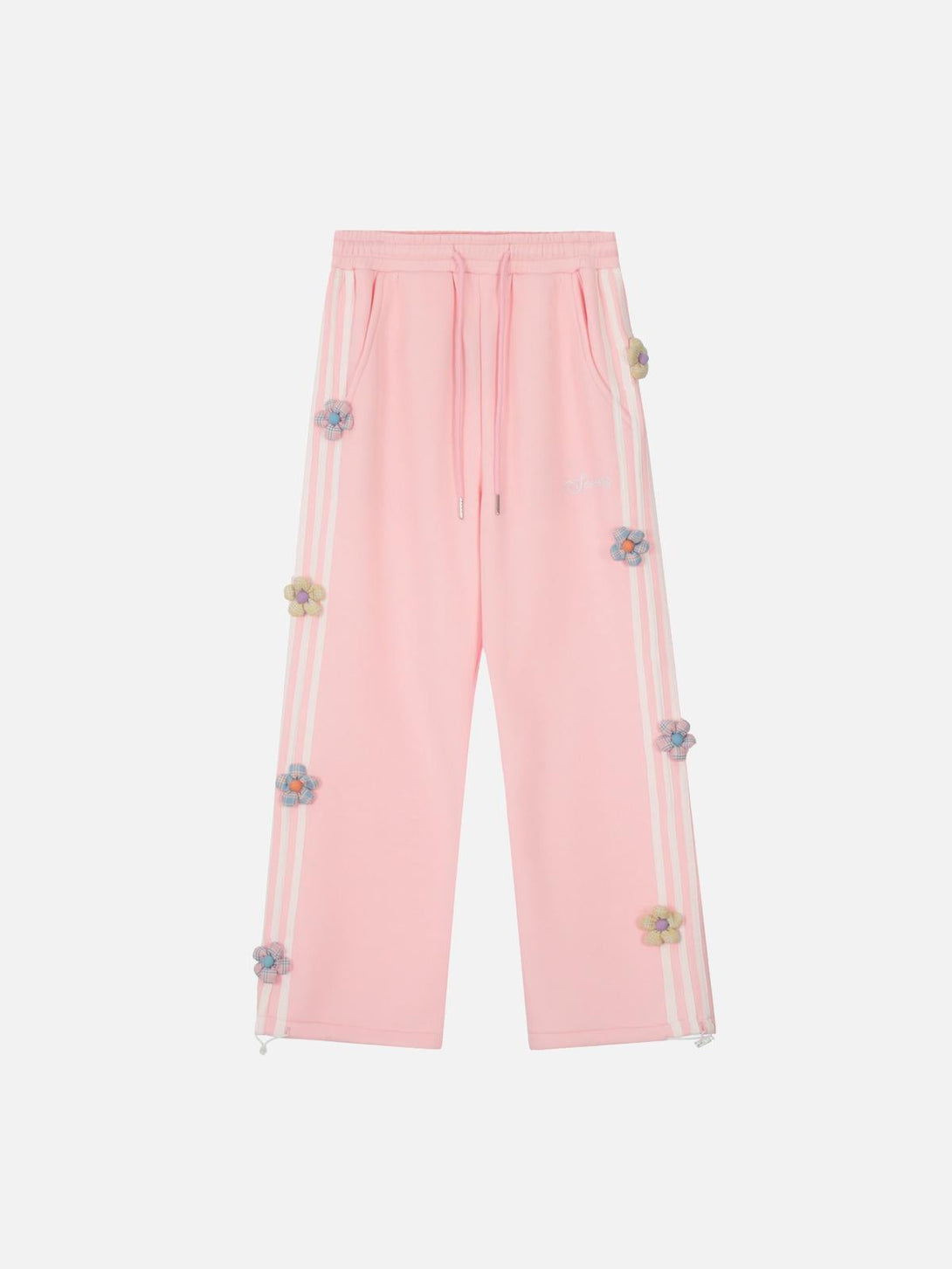 Front view of pink casual pants by TALISHKO featuring 3D flower accents and stripe details.