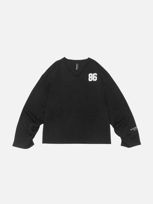 Black V-neck sweatshirt with "86" embroidery by TALISHKO, front view in casual style.