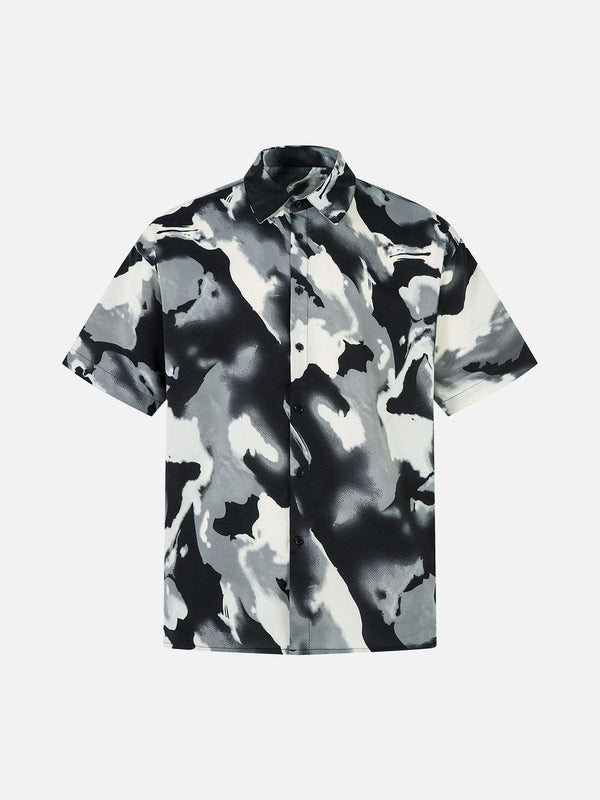 Front view of a black abstract tie-dye shirt by TALISHKO, perfect for bold street style.
