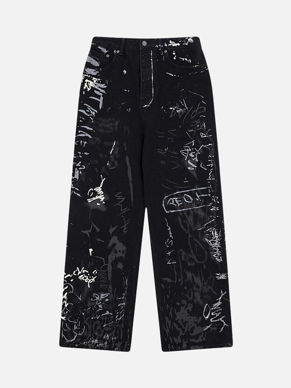 Front view of black jeans with graffiti print by TALISHKO, showcasing a bold street style.