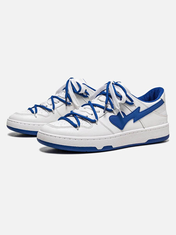 TALISHKO sneakers in white with blue accents, showcasing a stylish street-ready design.