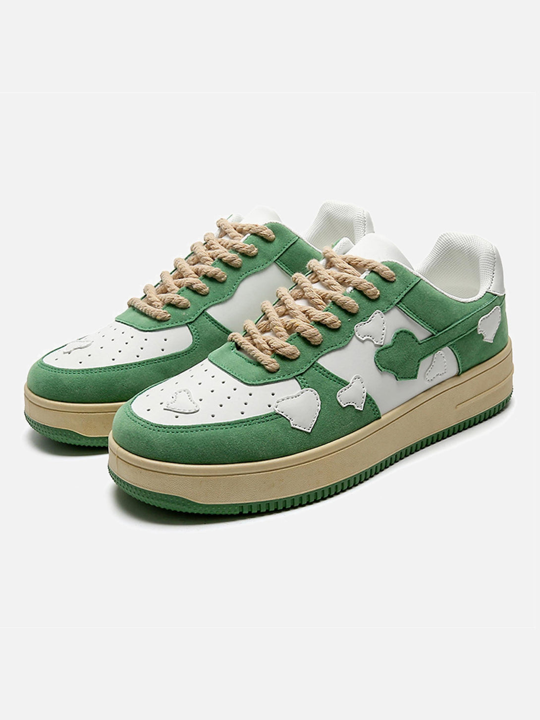 Front view of green retro casual shoes by TALISHKO featuring cloud patterns and rope laces.