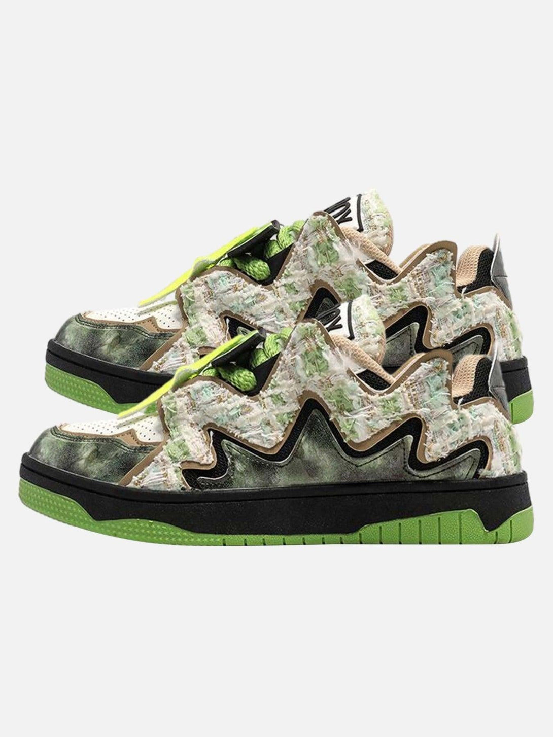TALISHKO sneakers in a green zigzag pattern, showcasing a bold high street design.