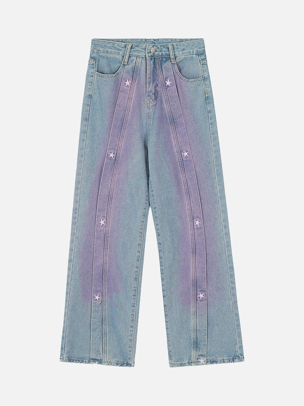 Front view of TALISHKO light blue jeans with spray-painted stars, perfect for casual style.