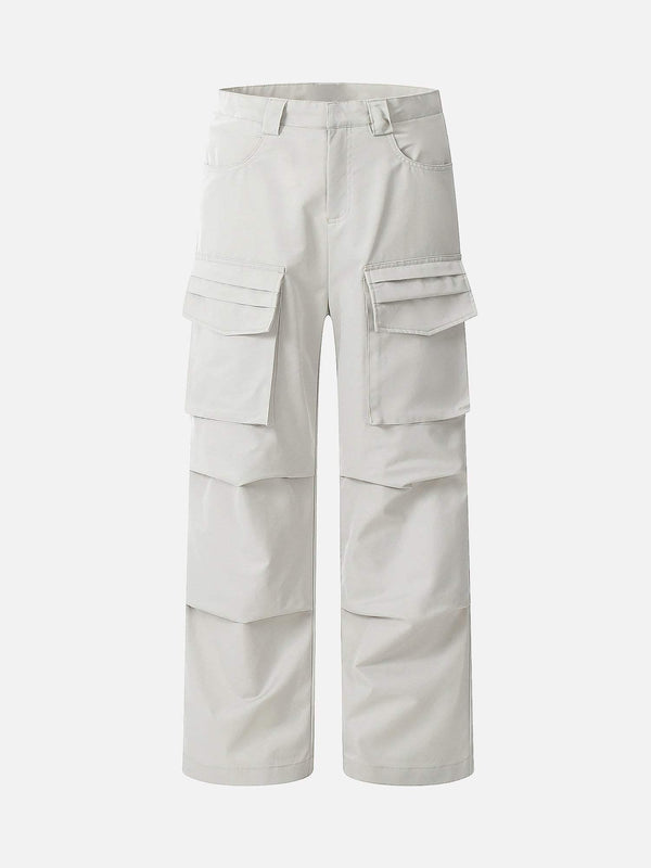 Front view of sand-colored casual overalls with pockets, designed by TALISHKO.