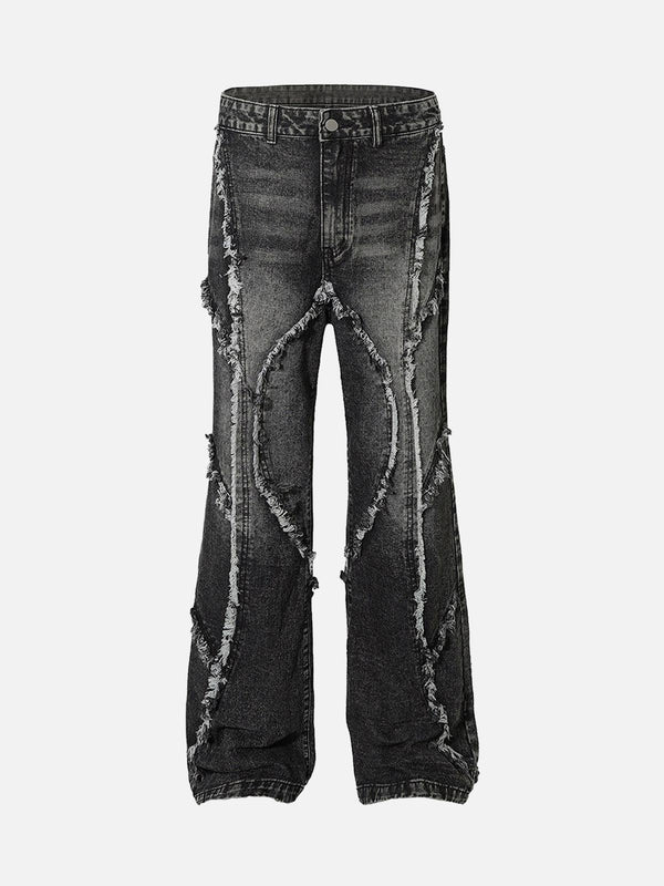 Front view of black jeans by TALISHKO, featuring unique distressed detailing for urban style.