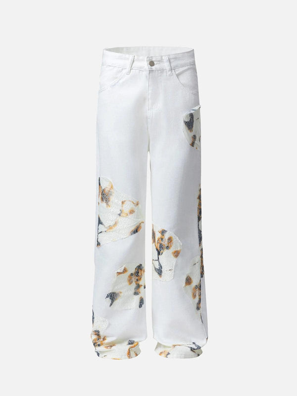 Front view of white patch jeans by TALISHKO, showcasing a trendy street-inspired design.